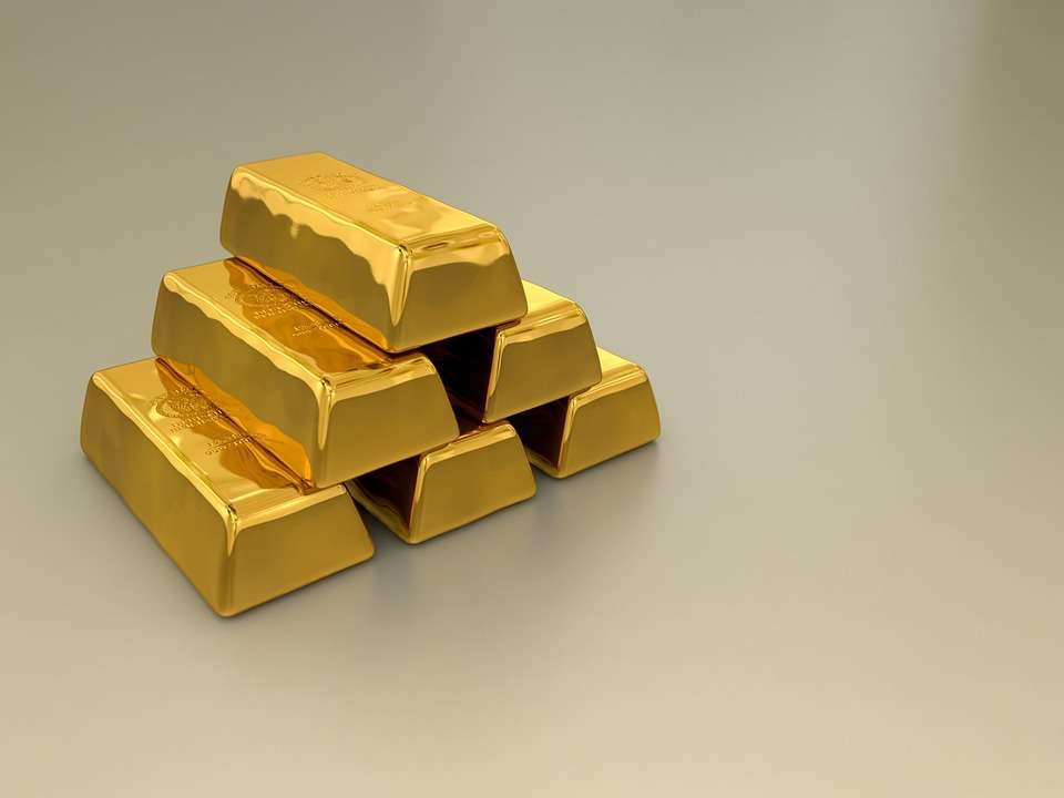 As the currency and rates are hurt by dismal PMIs, gold prices reached 2 weeks high